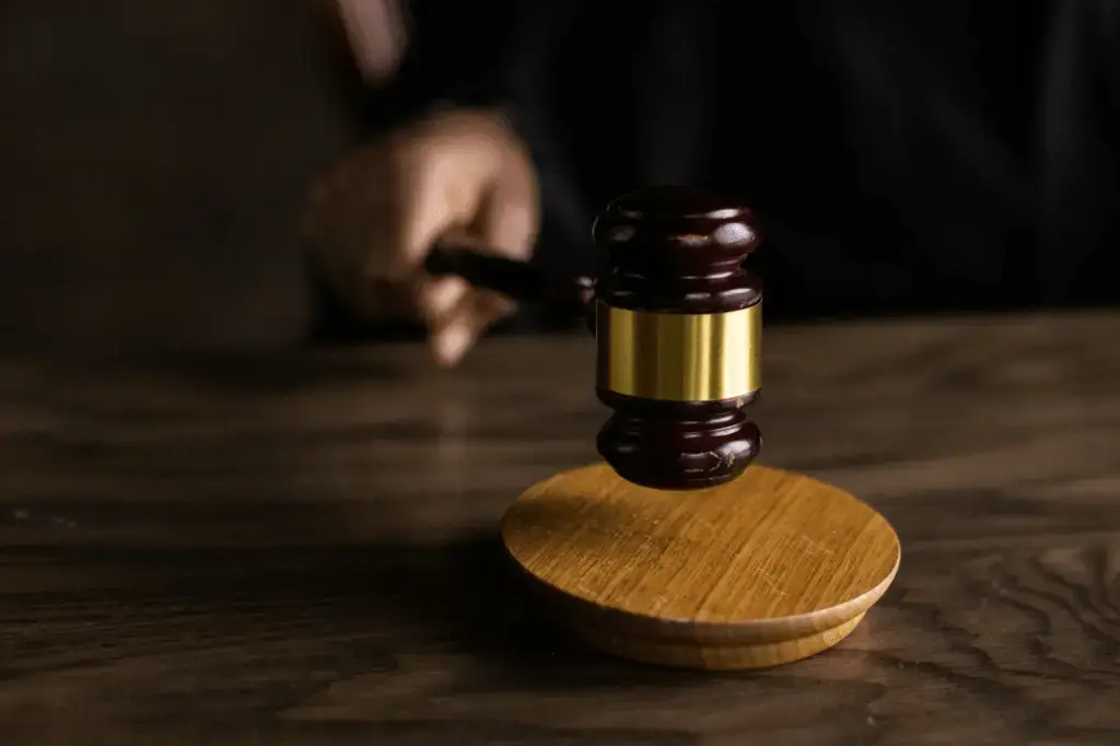 Gavel and sound block representing legal decisions for immigrant visa suspensions